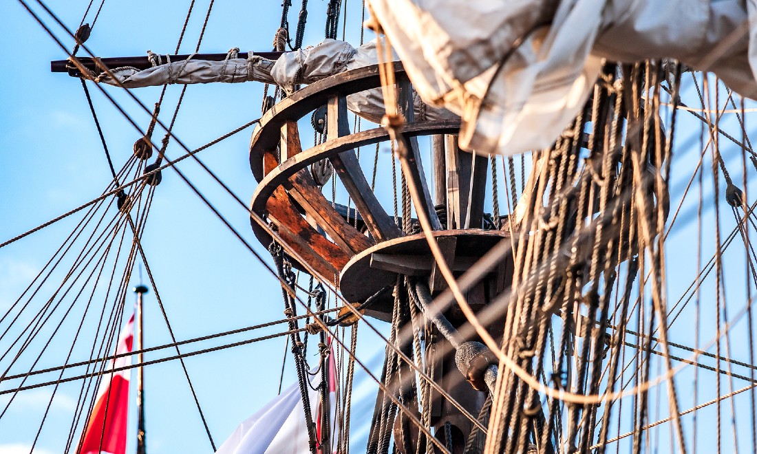 A vintage tall ship sails around the IJ during what would have been SAIL Amsterdam