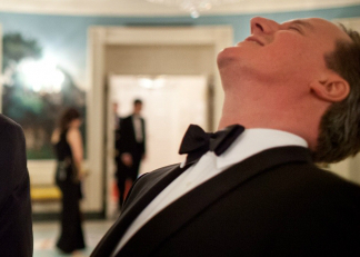 Former British prime minister David Cameron leaning backwards